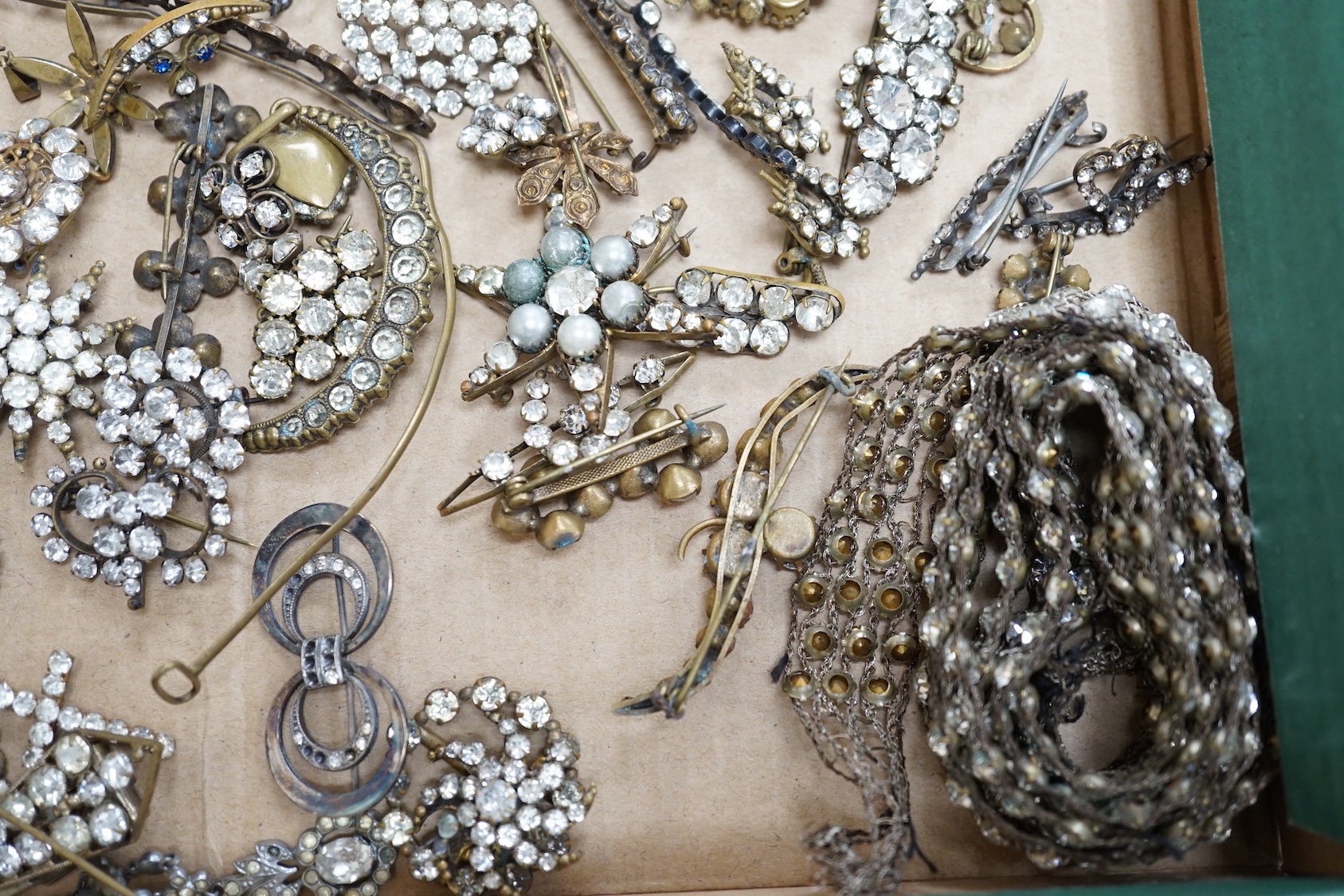 A quantity of assorted white paste jewellery, including brooches, hair ornament, etc.